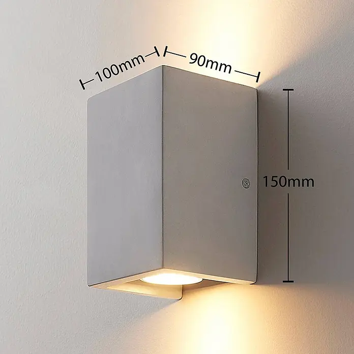 Lindby Wandleuchte Gerda - alu / grau / zink, GU10 - Graue rechteckige Up-Down-Wandleuchte (100x90x150mm), die warmes Licht abstrahlt.