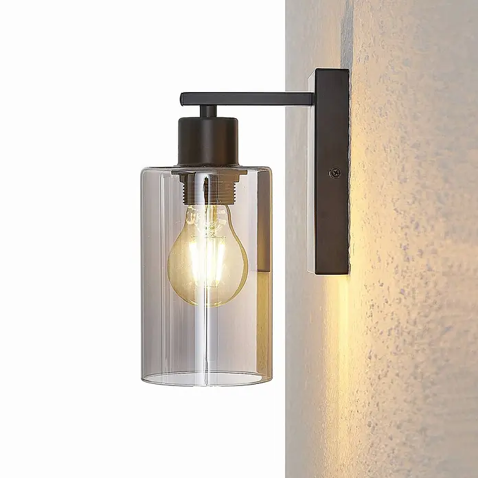 Lindby Wandleuchte Emavi - L x B x H: 15 x 10 x 23 cm, schwarz, schwarz, E27 - Industrielle Wandleuchte aus schwarzem Metall mit zylindrischem Rauchglas und glühender Edison-Birne.