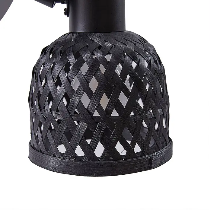 Lindby Wandleuchte Eskil - L x B x H: 10 x 10 x 15,8 cm, schwarz, E14 - Schwarzer geflochtener Lampenschirm, durch dessen Muster eine Glühbirne sichtbar ist.