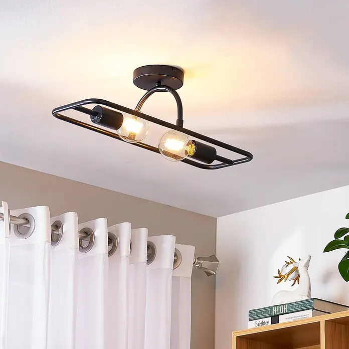 Lucande Wandleuchte Tornike - schwarz, E27 - Schwarze Deckenleuchte aus Metall mit rechteckigem Rahmen und zwei sichtbaren Edison-Glühbirnen, an der Decke montiert.