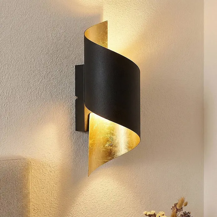 Lindby Wandleuchte Desirio - L x B x H: 10,5 x 8 x 24 cm, schwarz, G9 - Schwarze und goldene geschwungene Wandleuchte mit warmem Licht.
