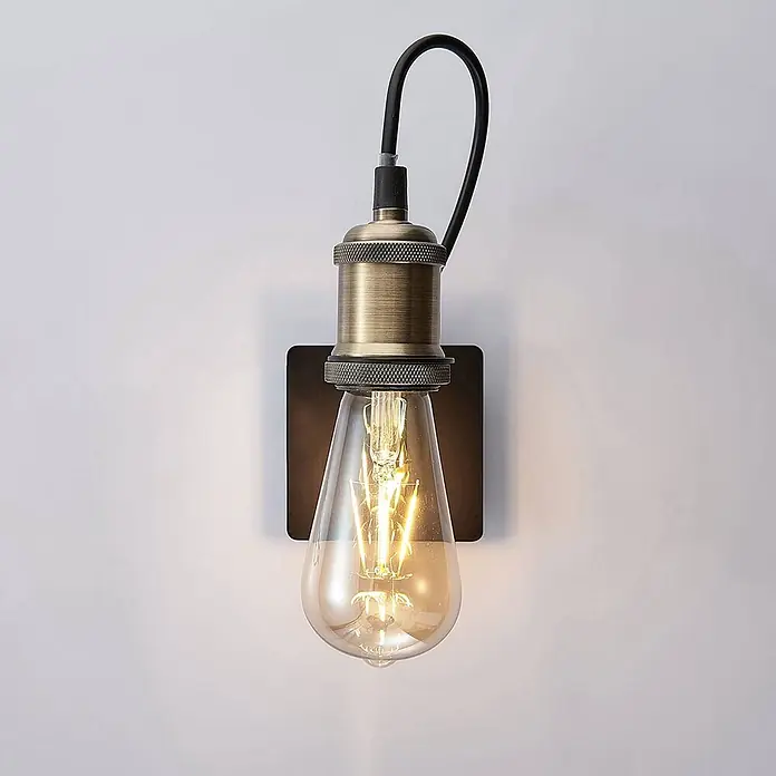 Lindby Wandleuchte Aurella - bronze / altmessing, E27 - Vintage Wandleuchte mit antikem Messingsockel und leuchtender klarer Edison-Glühbirne.
