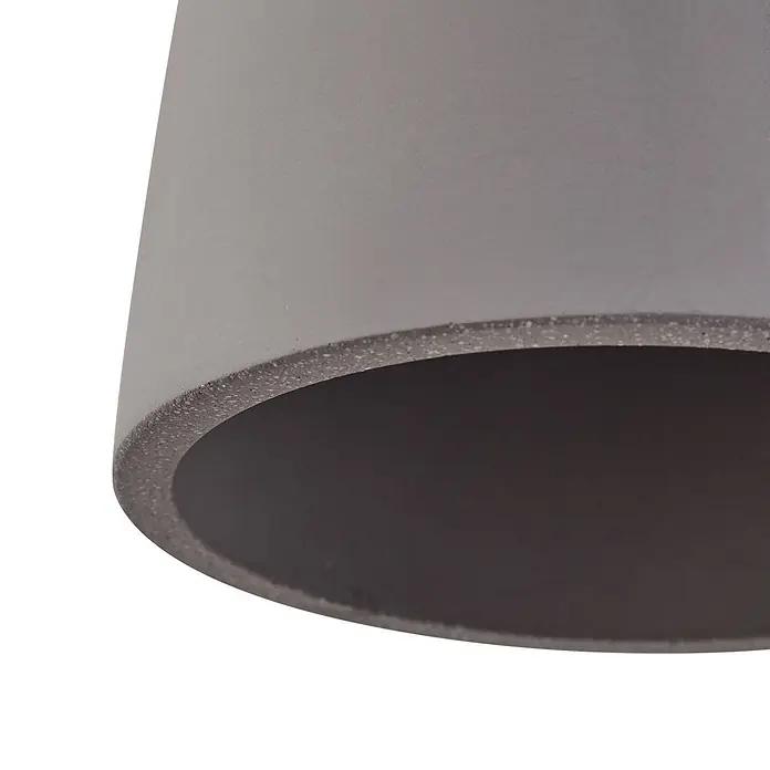Lindby Pendelleuchte Sanne - alu / grau / zink, betongrau, E27 - Grauer Betonzylinder mit strukturierter Kante und dunklem Inneren.