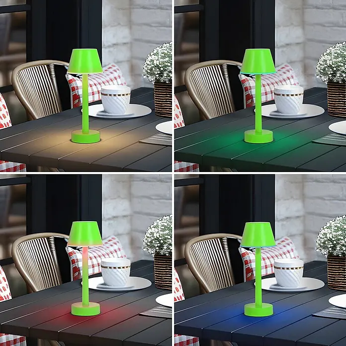 Lindby Tischleuchte Gaja - grün, grün - Grüne LED-Tischlampe auf einem dunklen Terrassentisch, zeigt warmweißes, grünes, rotes und blaues Licht. Ideal für Außenbereiche.