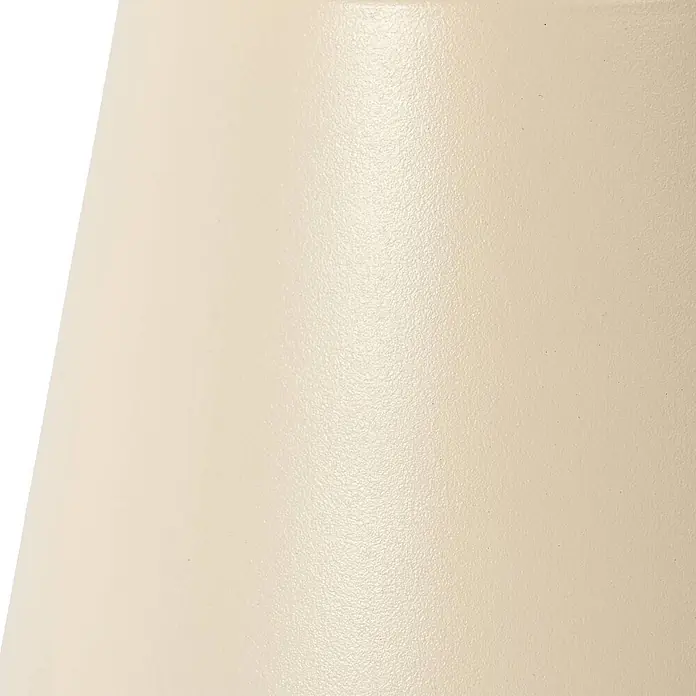 Lindby Tischleuchte Janea - creme / amber, creme / amber - Nahaufnahme einer cremefarbenen Produktoberfläche mit feiner Textur.