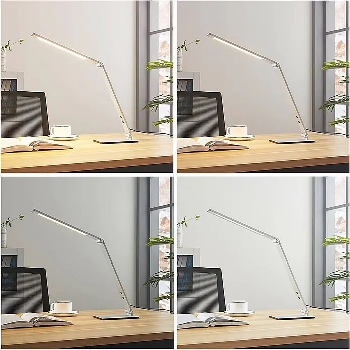 Lucande Tischleuchte Nicano - L x B x H: 34,5 x 12 x 39 cm, alu / grau / zink, alu / grau / zink - Verstellbare silberne LED-Schreibtischlampe spendet helles Licht auf einem Holzschreibtisch mit Buch und Kaffeetasse, ideal zum Lernen oder Arbeiten.