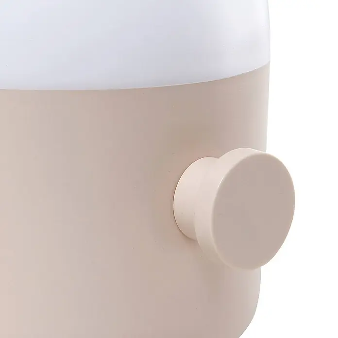 Lindby Tischleuchte Isaline - creme / amber, creme / amber - Zweifarbiger hellbeiger und weißer Behälter mit einem runden, passenden hellbeigen Knopf an der Seite.