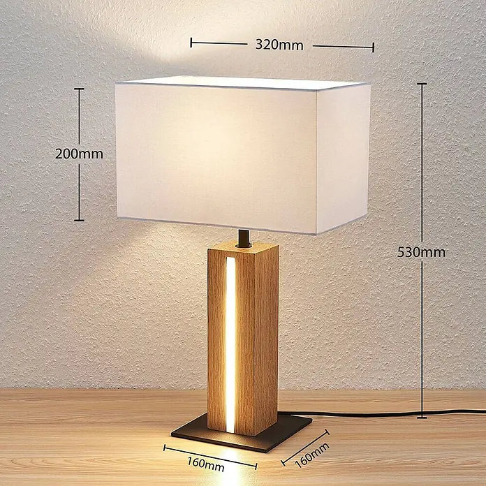 Lindby Tischleuchte Garry - L x B x H: 32 x 20 x 52,5 cm, Holz hell, weiß / opal, E27 - Eine moderne Tischleuchte mit rechteckigem weißen Stoffschirm und hohem, rechteckigem Holzsockel mit vertikaler Lichtleiste.