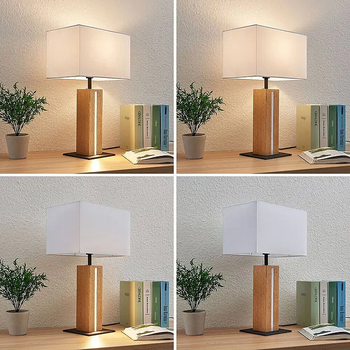 Lindby Tischleuchte Garry - L x B x H: 32 x 20 x 52,5 cm, Holz hell, weiß / opal, E27 - Rechteckige Tischleuchte mit weißem Stoffschirm und hellem Holzfuß mit vertikalem LED-Streifen, auf einem Holzschreibtisch.