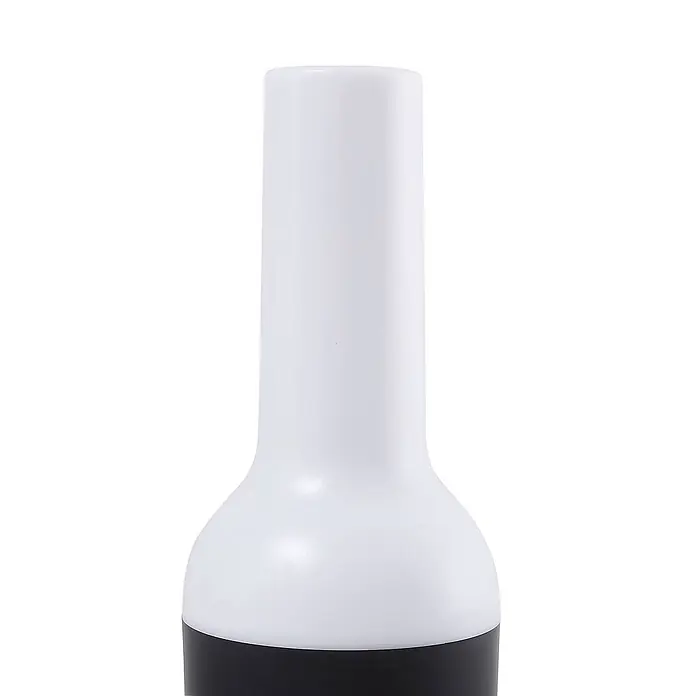 Lindby Tischleuchte Isaline - schwarz, weiß / opal - Weiße, durchscheinende Flasche mit zylindrischem Hals, abgerundetem Körper und schwarzem Boden.