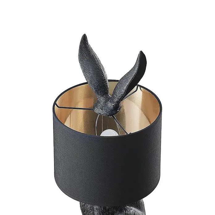 Lindby Tischleuchte Lorentina - L x B x H: 24 x 24 x 56 cm, schwarz, E27 - Tischlampe mit schwarzem Stoffschirm, goldener Innenseite und schwarzen Hasenohren als Detail.