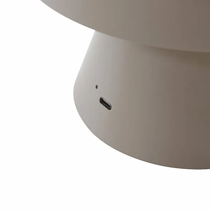 Lindby Tischleuchte Nevijo - alu / grau / zink, alu / grau / zink - Glattes, hellbeiges Gerät mit USB-C-Ladeanschluss und einer kleinen Kontrollleuchte.