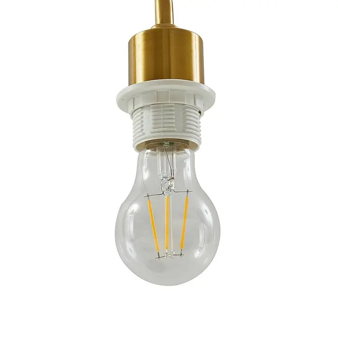 Lindby Tischleuchte Hillary - schwarz, schwarz, E27 - Klare LED-Glühbirne mit gelben Filamenten, in eine weiße Kunststofffassung mit goldfarbener Metallhalterung geschraubt.