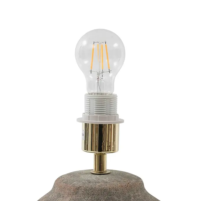 Lucande Tischleuchte Thalorin - braun / rost, E27 - Klare LED-Glühbirne mit sichtbaren Filamenten in weißer Fassung und goldenem Anschluss auf einem strukturierten, grau-braunen Lampenfuß.