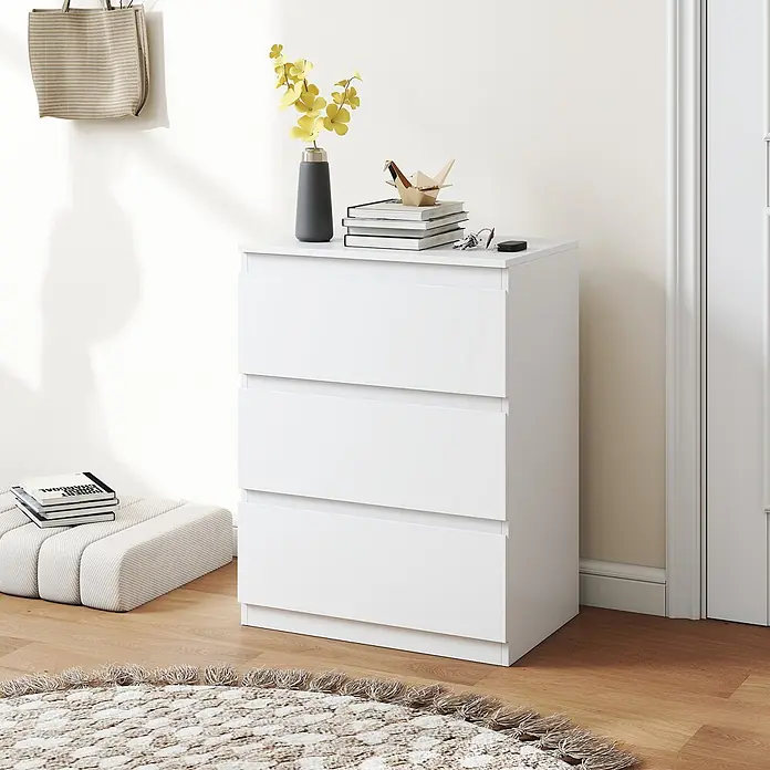 Homcom Kommode 1-teilig - L x B x H: 60 x 40 x 79 cm, Weiß, Anzahl Schubladen: 3 Stk. - Weiße Kommode mit drei Schubladen in einem hellen Raum, dekoriert mit Vase und Büchern.