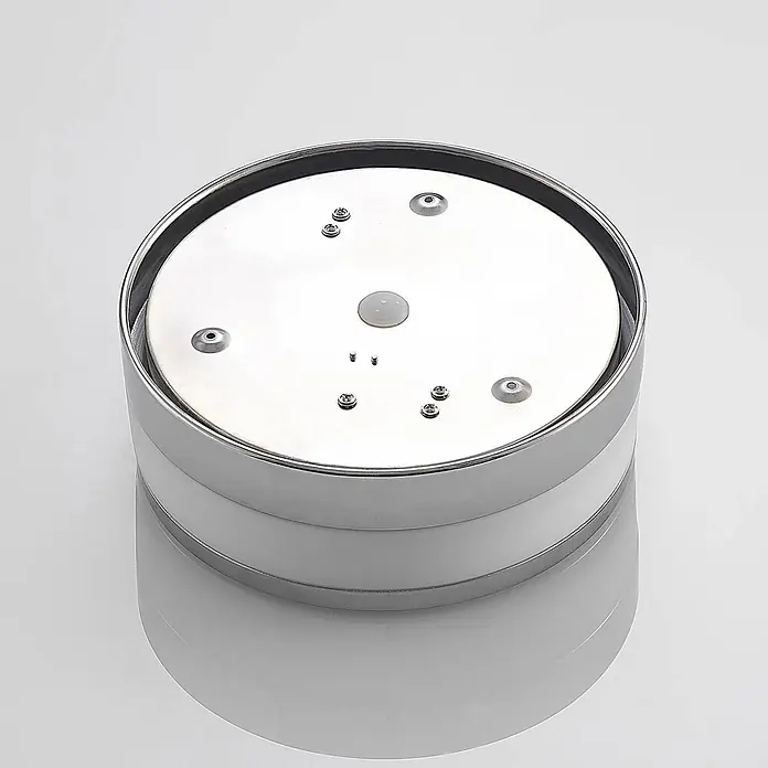 Lindby Deckenleuchte Flavi - L x B x H: 23 x 23 x 9 cm, chrom / silber, E27 - Glänzender, runder Metallsockel mit sichtbaren Schrauben und einem zentralen, durchsichtigen Knopf.