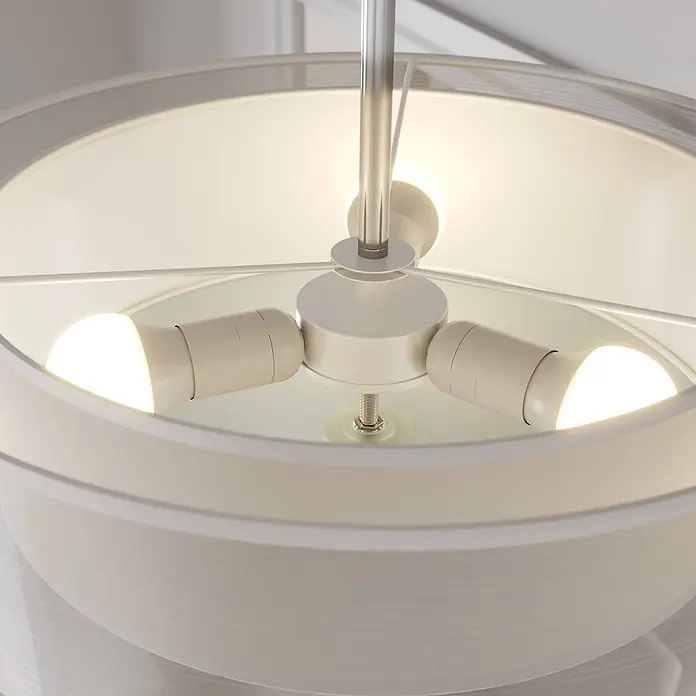 Lindby Deckenleuchte Pikka - weiß / opal, E27 - Innenansicht einer weißen Trommelleuchte mit drei hellen LED-Glühbirnen und gebürsteter Metallstange.
