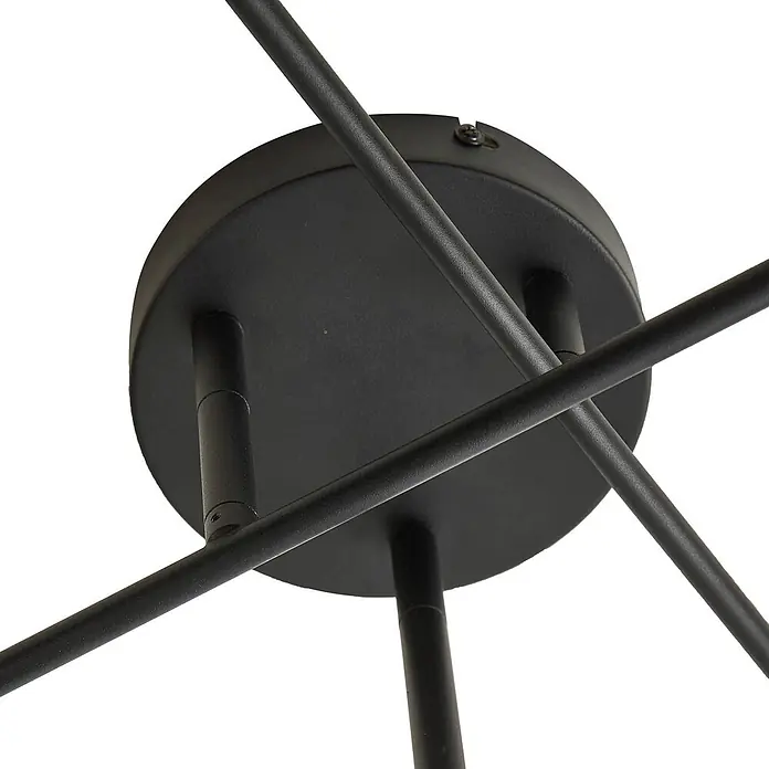 Lindby Deckenleuchte Estar - schwarz, E27 - Nahaufnahme einer schwarzen Deckenplatte aus Metall mit mehreren sich kreuzenden Stäben, Teil einer Leuchte.