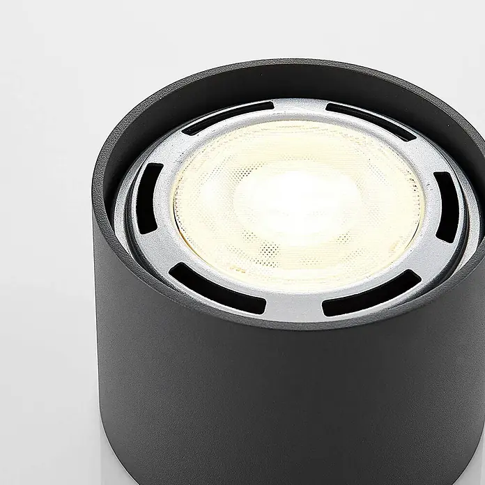 Arcchio Deckenstrahler Mabel - alu / grau / zink, alu / grau / zink, GU10 - Dunkelgrauer zylindrischer LED-Strahler mit metallischem Innenring und warmweißem Licht.