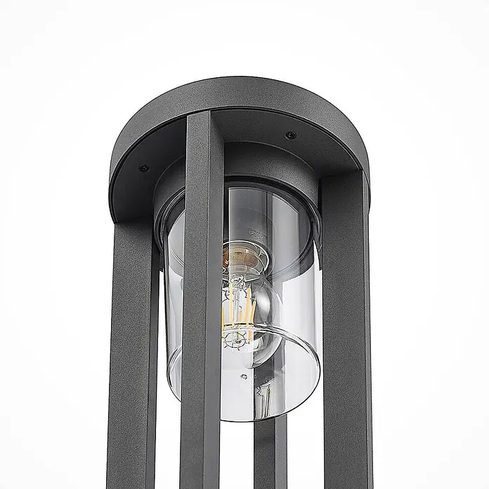 Lucande Außenwandleuchte Overa - alu / grau / zink, alu / grau / zink, IP44 - Dunkelgraue Metall-Außenleuchte mit klarem Glaszylinder und LED-Filamentlampe.