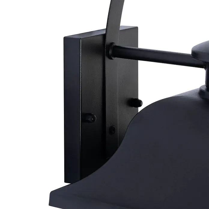 Lindby Außenwandleuchte Mertollio - 26,9 x 23,5 x 47,4 cm, schwarz, klar / transparent, IP43 - Nahaufnahme einer schwarzen, matten Metall-Wandleuchte, die ihre rechteckige Montageplatte und den Verbindungsarm zeigt.