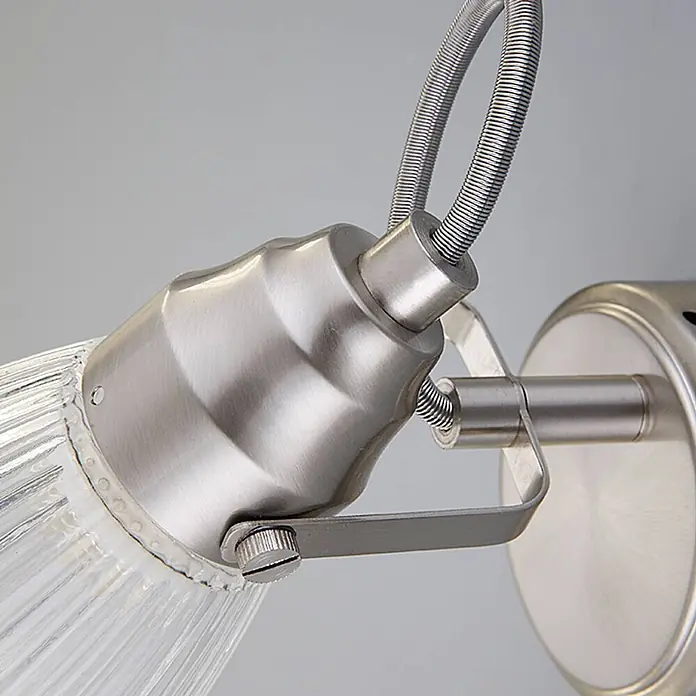 Lindby Wandleuchte Kara - L x B x H: 14 x 9 x 21 cm, alu / grau / zink, G9 - Wandstrahler aus gebürstetem Metall mit geripptem Klarglasschirm, an verstellbarer Halterung montiert.