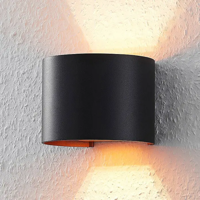 Arcchio Wandleuchte Zuzana - L x B x H: 11,2 x 13 x 9,7 cm, schwarz, G9 - Schwarze, gebogene Wandleuchte mit Kupfer-Innenseite, die warmes Licht nach oben und unten wirft.