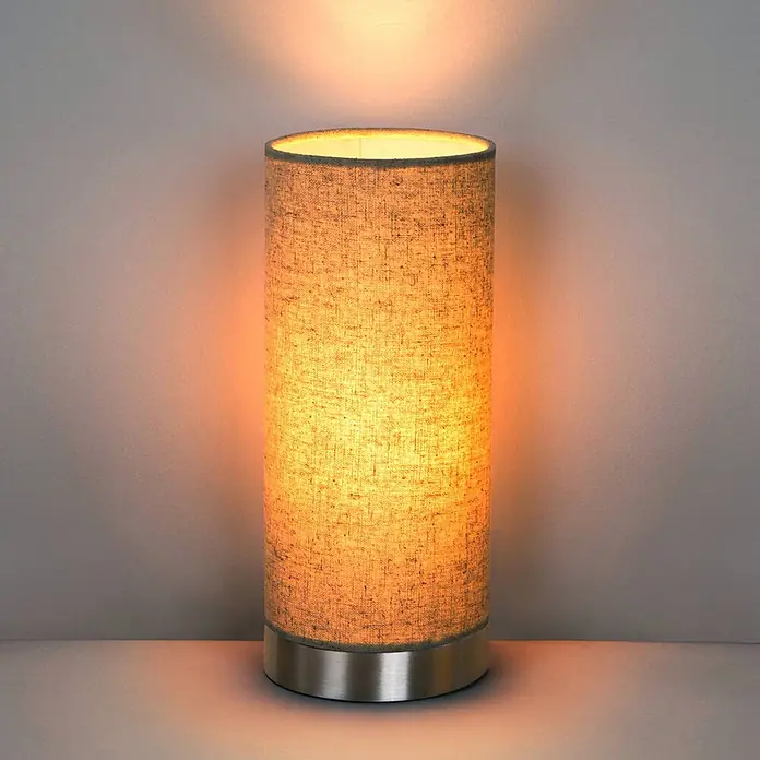 Lindby Tischleuchte Ronja - creme / amber, E14 - Zylindrische Tischlampe mit beigem strukturiertem Stoffschirm und Metallsockel, leuchtend mit warmem Licht.