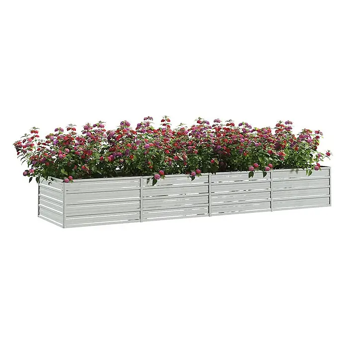 Furnicato Hochbeet - 320 x 80 x 45 cm, Stahl, Silber - Langer grauer Pflanzkasten aus Lamellen, gefüllt mit leuchtend roten und violetten Blumen.