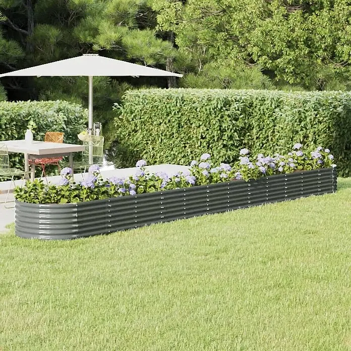 Furnicato Hochbeet - 512 x 80 x 36 cm, Stahl, Grau - Langes, dunkelgraues Hochbeet aus Wellblech mit lila Blumen.