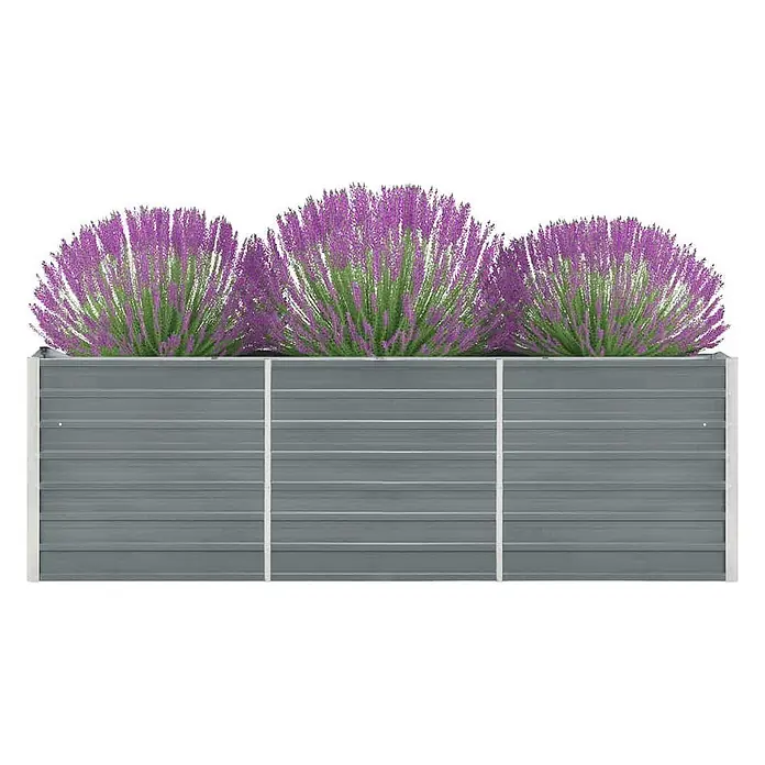 Furnicato Hochbeet - 40 x 240 x 77 cm, Stahl, Grau - Graues Wellblech-Hochbeet mit leuchtend violetten Lavendelpflanzen.