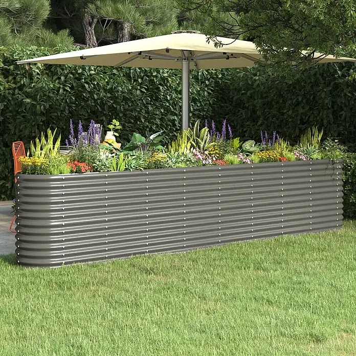 Furnicato Hochbeet - 332 x 332 x 68 cm, Stahl, Grau - Langes, graues Hochbeet aus Wellblech, gefüllt mit bunten Pflanzen in einem Garten.