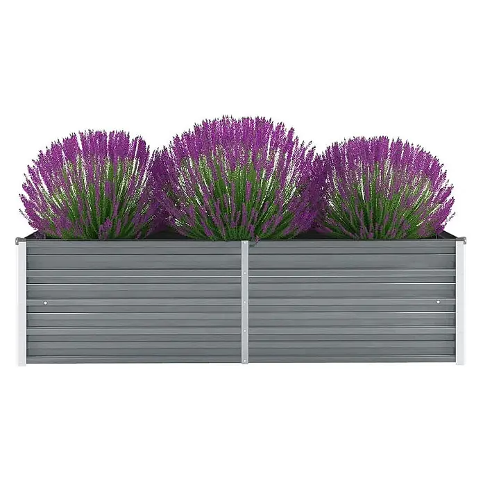 Furnicato Hochbeet - 160 x 40 x 45 cm, Stahl, Grau - Graues Hochbeet aus Wellblech mit drei Abschnitten leuchtend violetter Blumen.