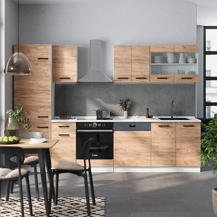 Vicco Küchenzeile R-Line Goldkraft Eiche/Weiß AP Eiche - Goldkraft Eiche, Ohne Elektrogeräte - Moderne Küche mit Holzoptik-Schränken, integrierten dunklen Geräten und weißer Arbeitsplatte in einem Zuhause.