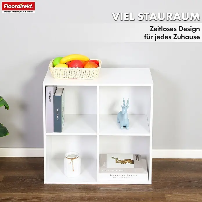 Floordirekt Holzregal Bücherregal California mit 4 Fächern - Anzahl Böden: 4 Stk., Schrauben - Weißes Würfelregal mit vier Fächern und einer Obstschale obenauf, gefüllt mit Büchern, einer Vase und einer Dekofigur.
