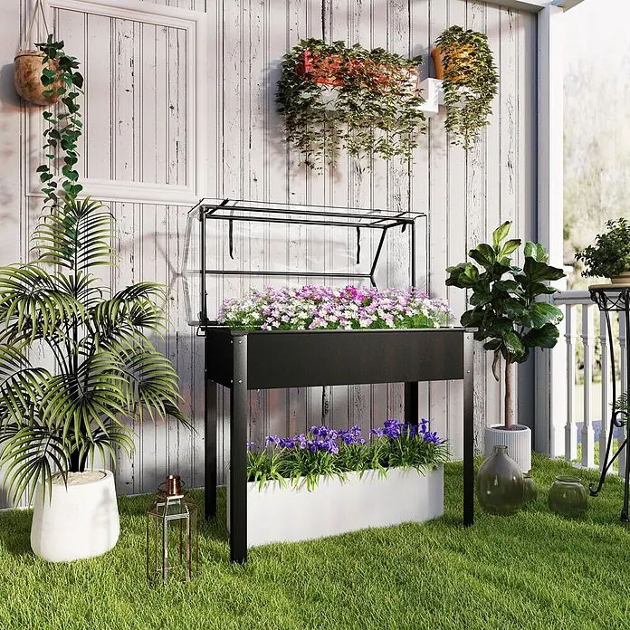 Outsunny Kräuterhochbeet - L x B x H: 100 x 48 x 124 cm - Schwarzes Hochbeet aus Metall mit transparenter Abdeckung für Pflanzen und Blumen, draußen auf Rasen platziert.