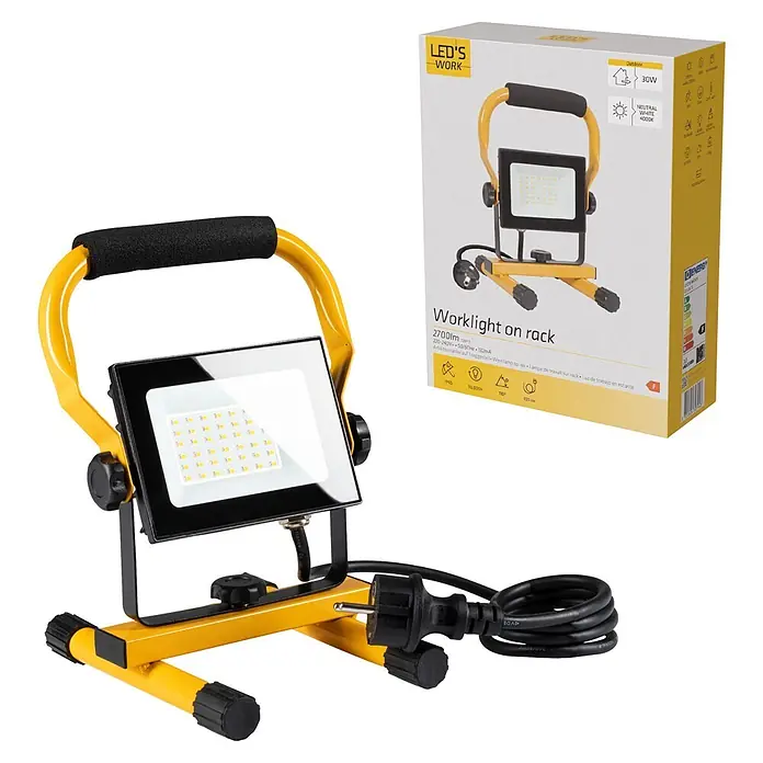 LED's work LED-Arbeitsleuchte - L x B x H: 18 x 18 x 24 cm, 2.700 lm, Lichtfarbe: Neutralweiß, Netzbetrieben, IP65 - Gelbe LED-Arbeitsleuchte auf Ständer mit schwarzem Griff, aufgerolltem Netzkabel und Produktverpackung.