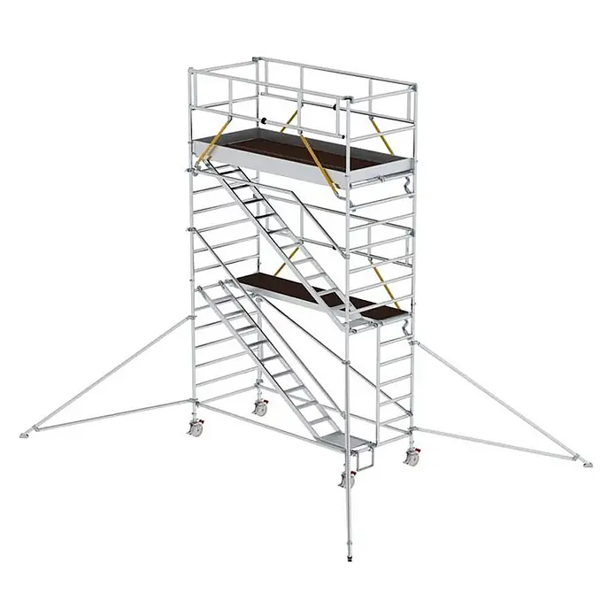 Munk Rollgerüst Rollgerüst SG mit Schrägaufstiegen 1,35x3,00m und Ausleger 6,47m AH - Arbeitshöhe: 6.470 m - Silberner Fahrgerüstturm mit Innentreppen, dunklen Plattformen, Geländern, Rollen und Auslegern.