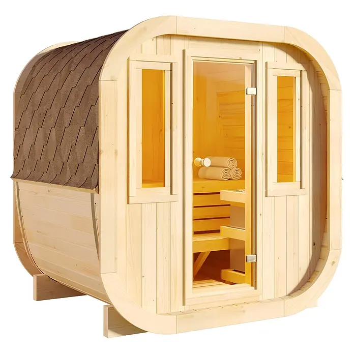 FinnTherm Fasssauna ScandiCube Mini XS - Holz, L x B x H: 166 x 21 x 214 cm - Fasssauna aus hellem Holz mit braunem Schindeldach, Glastür und Fenstern, Innenbereich mit Bänken und Handtüchern.