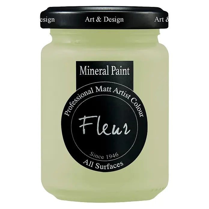 Fleur Pintura mineral - Veranda Green, 130 ml, Mate - Tarro de cristal con pintura verde pálido, tapa negra y etiqueta negra con la palabra 'Fleur'.