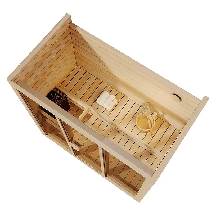 FinnTherm Massivholzsauna Kuuma M - Elektroofen, L x B x H: 111 x 199 x 213 cm - Draufsicht auf das Innere einer hellen Holzsaunakabine mit Heizung, gefalteten Handtüchern und Holzeimer mit Schöpfkelle.