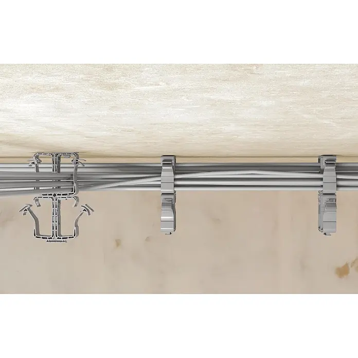 Fischer Universal-Dübel Montagesockel Steckfix plus SF MS - Grau, 50 Stk. - Graue Kunststoff-Kabelhalterungen sicher an einer Oberfläche montiert, ordnen und halten mehrere graue Kabel.