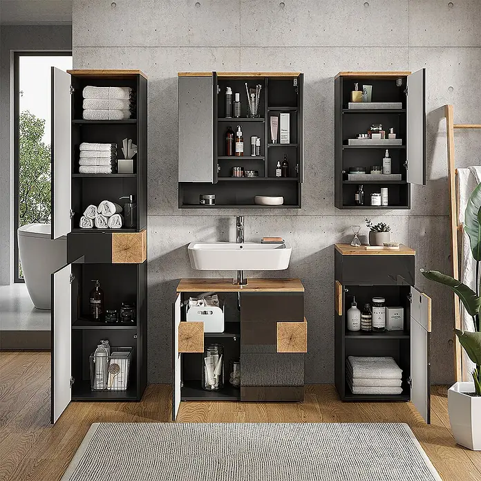 Vicco Badmöbel-Set Eden Anthrazit 5 Teile - Gesamtbreite Badmöbel: 153,1 cm, Anthrazit, Matt - Moderne dunkelgraue Badmöbel mit Holzdetails, bestehend aus Waschtisch, Spiegelschrank und Hochschränken, gefüllt mit Pflegeprodukten und Handtüchern.