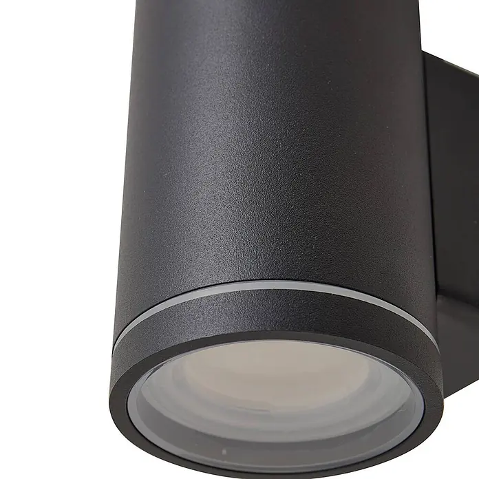 Lindby Außenwandleuchte Valtin - schwarz, schwarz, IP54 - Schwarze zylindrische Außenwandleuchte mit strukturierter Oberfläche und klarem Diffusor.