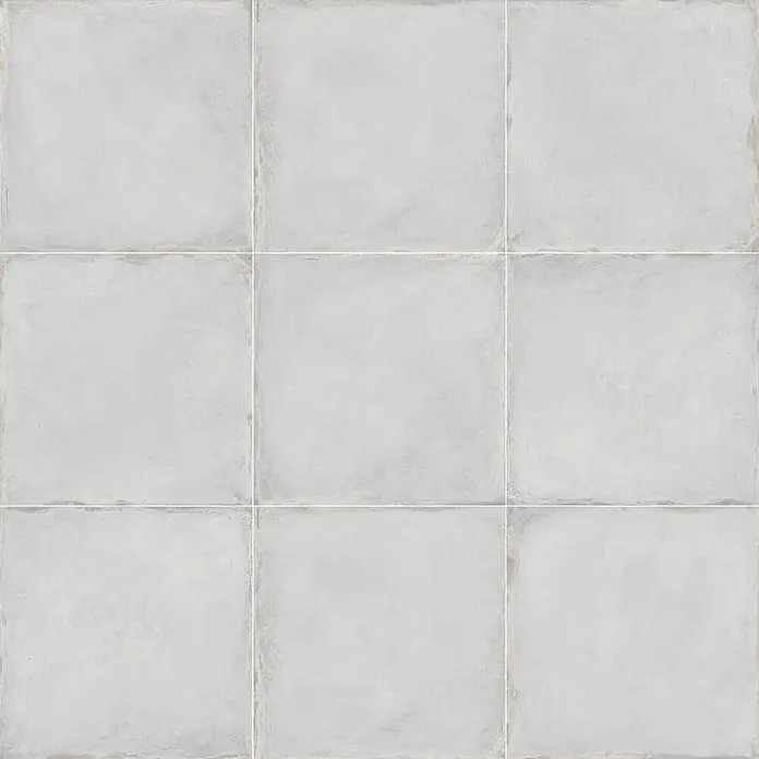 Feinsteinzeugfliese Triana - 24,8 x 24,8 cm, Gris, Matt - Hellgraue quadratische Fliesen mit strukturierter Betonoptik und sichtbaren Fugen.