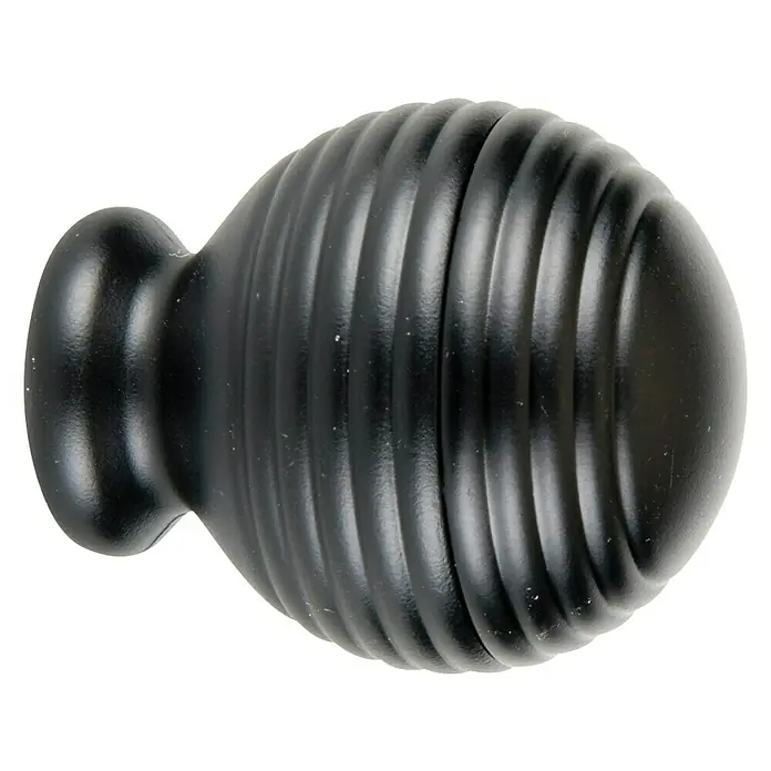 Tapa final Colonial pomo - 1 ud. - Primer plano de un pomo negro redondo para muebles con superficie acanalada y base de montaje, ideal para cajones o armarios.