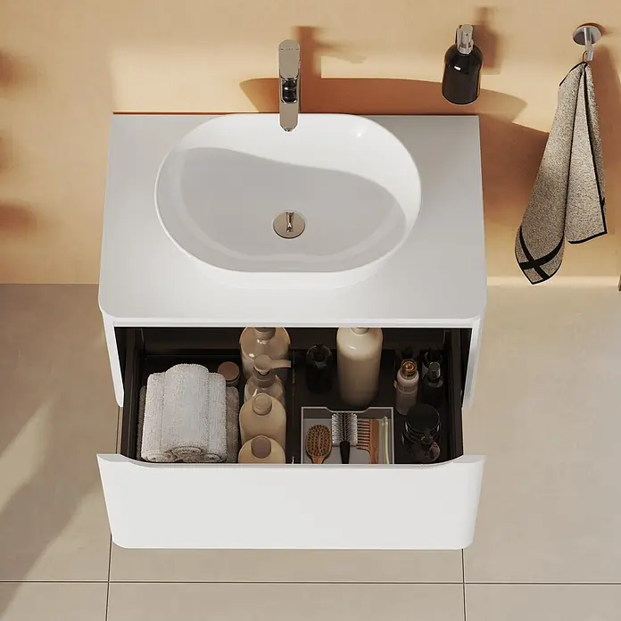 VitrA Integra Round Waschtischunterschrank Integra Round - B x T x H: 76,5 x 52 x 42 cm, Weiß - Weißer Badezimmerschrank mit integriertem Waschbecken und offener Schublade, ordentlich organisiert mit Kosmetikflaschen, Bürsten und Handtüchern.