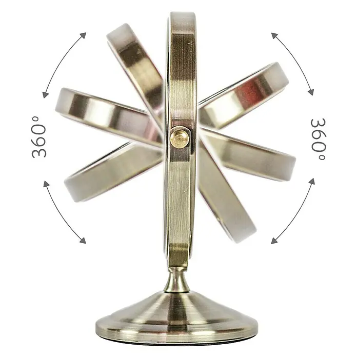 Deblanch Espejo cosmético - 15 x 15 cm, Redonda, Oro viejo, Aumento 1: 300 %, Aumento 2: 700 % - Primer plano de un espejo de tocador giratorio con marco y base metálicos, que muestra su rotación completa de 360 grados.