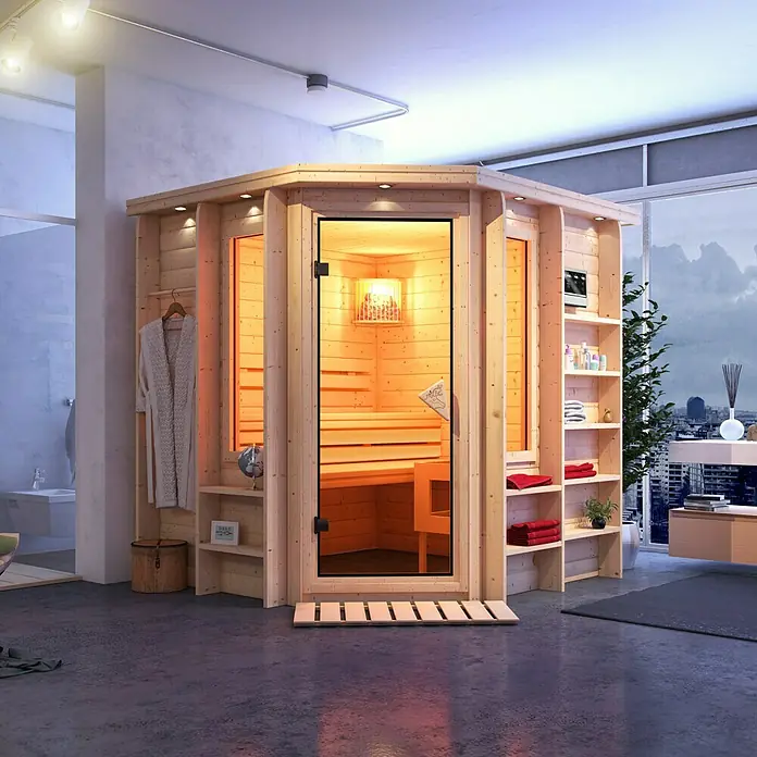 Karibu Bodenrost Premium - 38 x 77 cm, Espenholz - Eine moderne Sauna aus hellem Holz mit Glasfront und Ablageflächen bietet Entspannung und Komfort.
