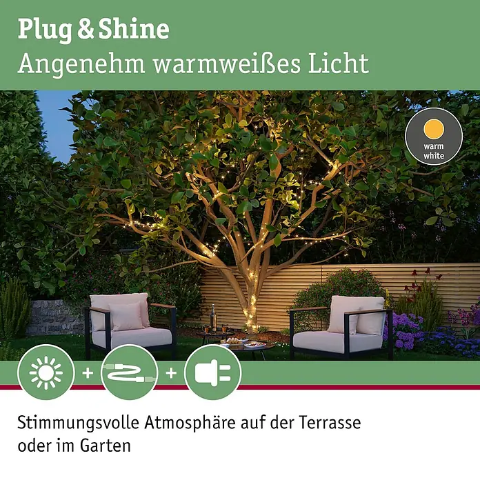 Paulmann Plug & Shine LED-Lichterkette Yuna - Außen, Warmweiß, Länge: 12,4 m - Warmweiße Lichterkette beleuchtet einen Gartenbaum und schafft eine stimmungsvolle Atmosphäre auf der Terrasse.